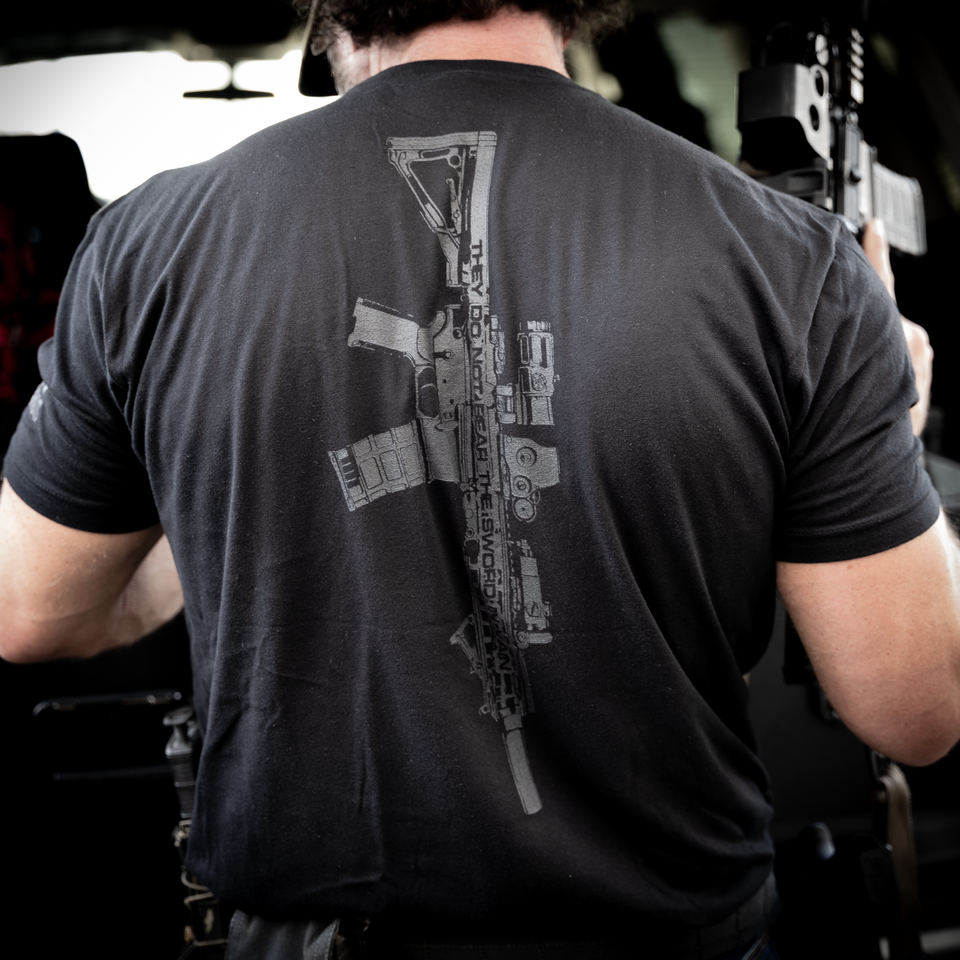 Valor Boards black T-shirt with rifle graphic on the back